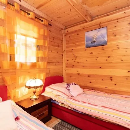Ferienhaus Gemuetliches Holzferienhaus In Gmina Postomino *